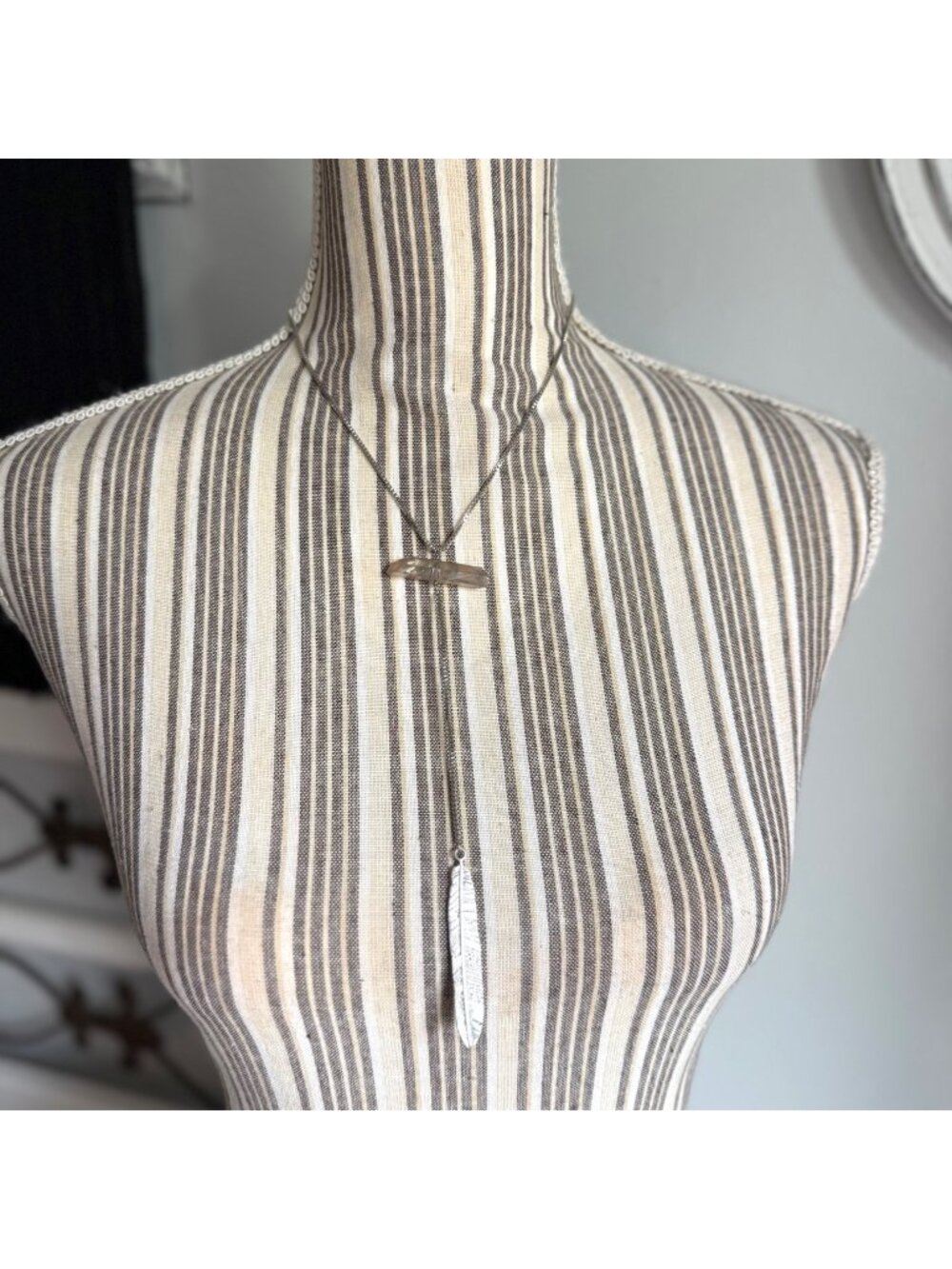 Silver Tone Y Necklace with Stone Accent and Feather Pendant